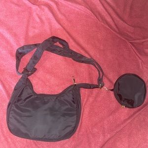 Black adjustable baguette purse with detachable mini coin purse